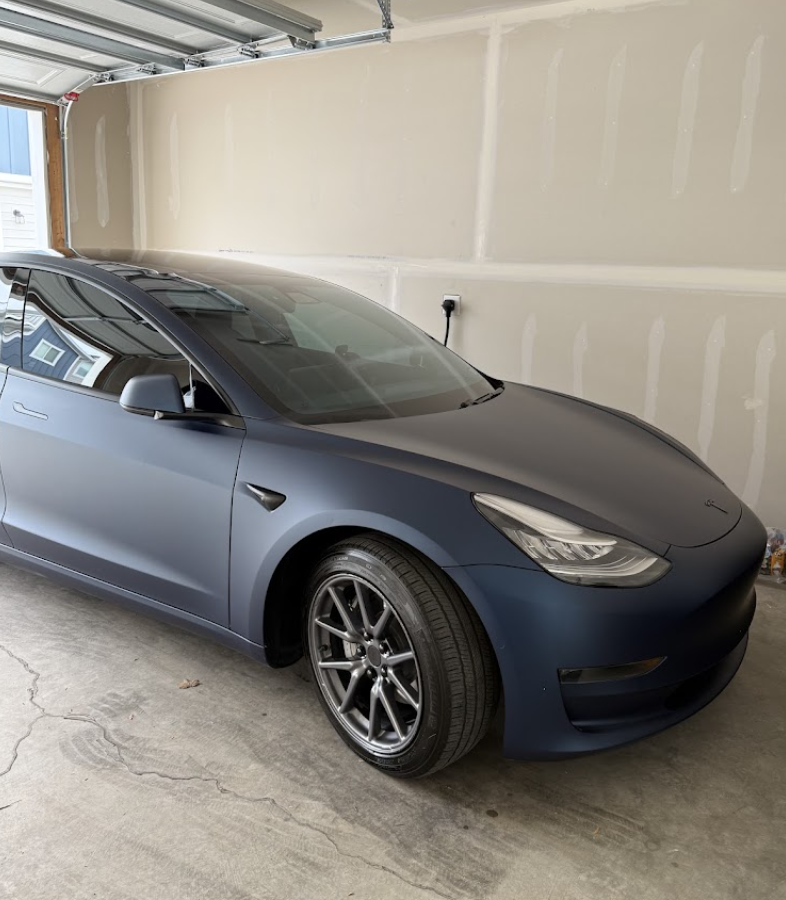 Matte blue Tesla Model 3 after detailing