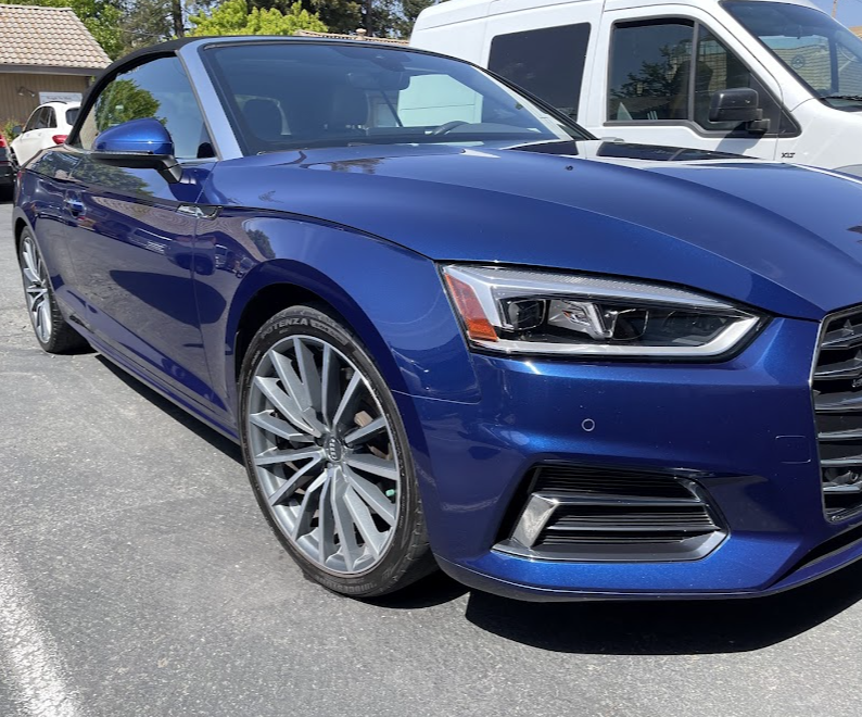 Blue Audi convertible after exterior detailing